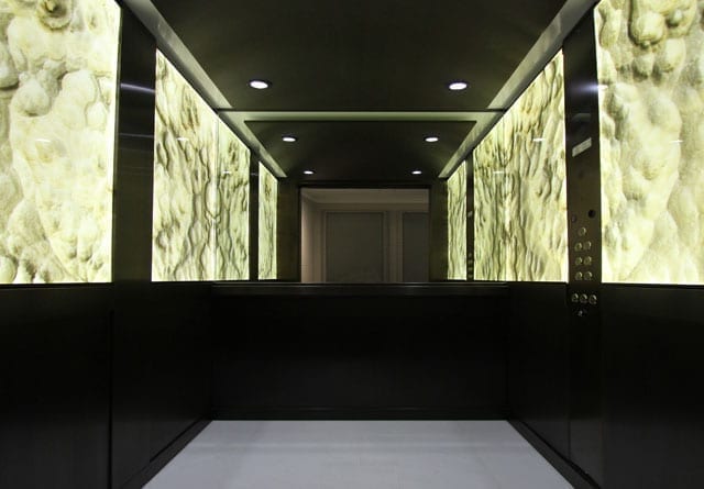 backlit stone onyx lift walls