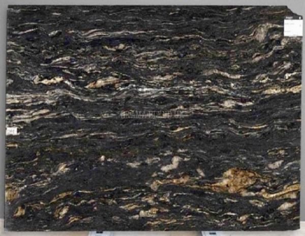 shot of smooth black cosmic stone from grama blend uk