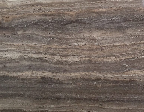close up of brown silver travertine stone from grama blend uk