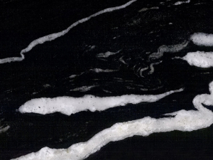 close up of copacabana dark granite stone from grama blend uk
