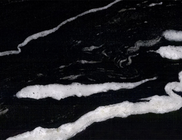 close up of copacabana dark granite stone from grama blend uk