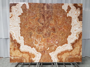 slab of brown stone from grama blend uk