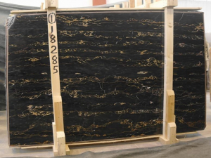 slab of nero portoro stone from grama blend uk
