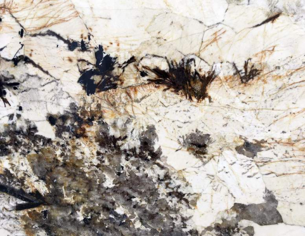 close up shot of polished patagonia granite from grama blend uk