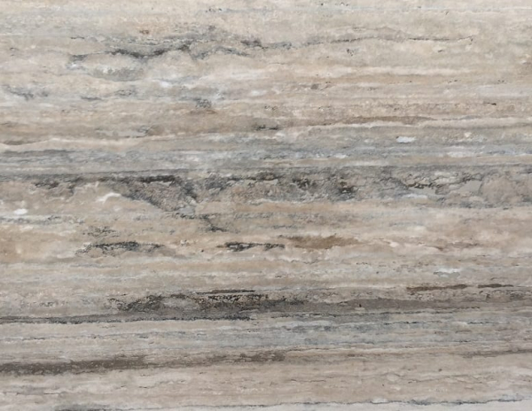 silver beige travertine close up shot of stone from grama blend uk